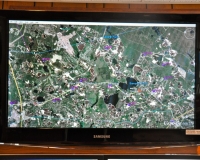 A 36" LCD GPS Apparatus Tracking screen tracks all 16 pieces  of Carver Fire Apparatus, 200+ Water Supplies, Med-Flight Landing Zones and our Hovercraft and Rescue Boat launch points.  The screen allows a dispatcher to enter the emergency Incident address and quickly zoom into the area seeing which water supplies, landing zones, etc., are closest and have the best access.  